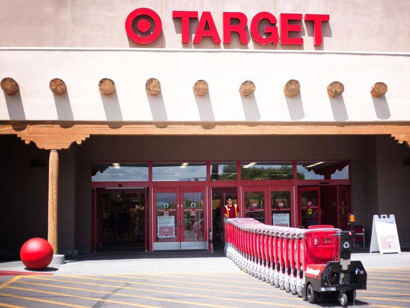 Santa Fe, NM: Target Employee Pulls Red Shopping Carts into Store