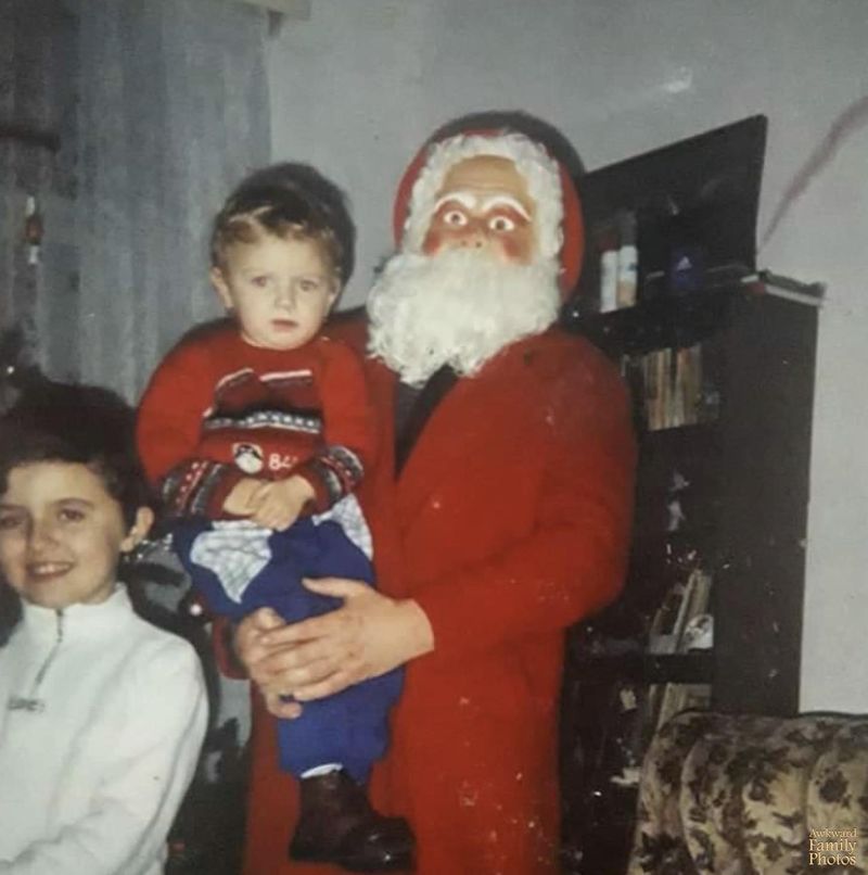 Santa with crazy eyes and kids