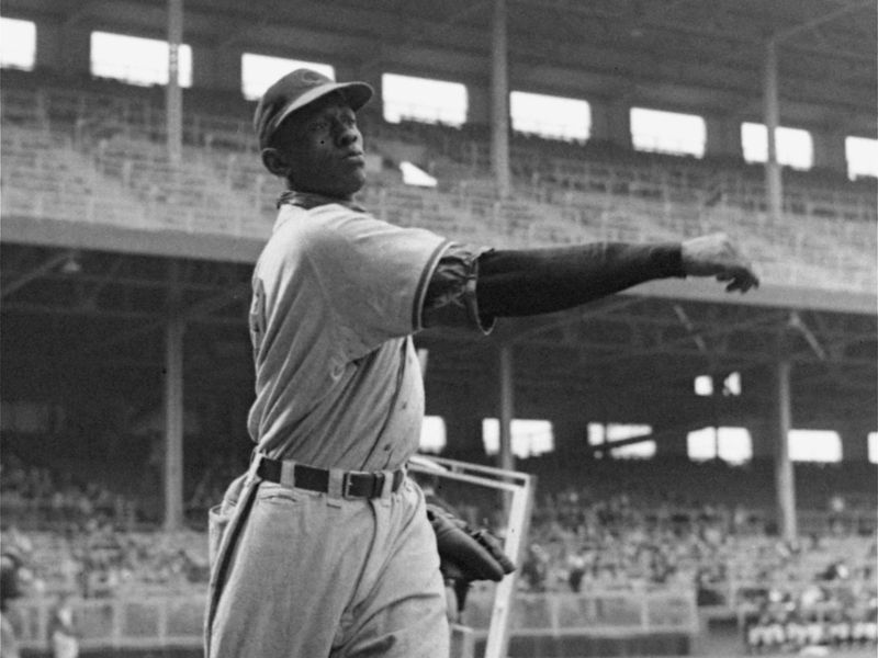 Satchel Paige warming up in 1949