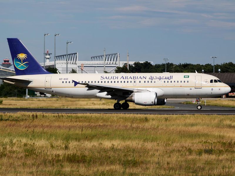 Saudia Saudi Arabian Airlines passenger plane at airport. Schedule flight travel. Aviation and aircraft. Air transport. Global international transportation. Fly and flying.