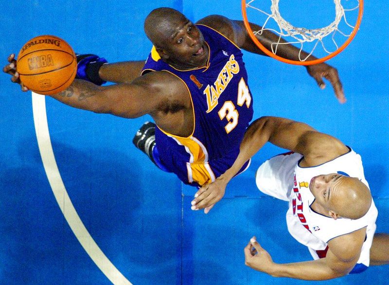 Shaquille O'Neal dunking with the Los Angeles Lakers