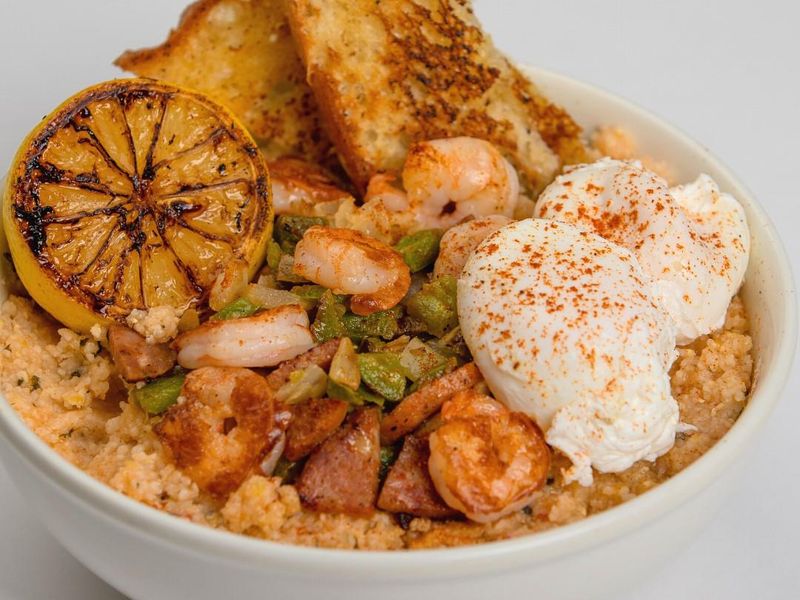 Shrimp and grits bowl at Eggs Up Grill