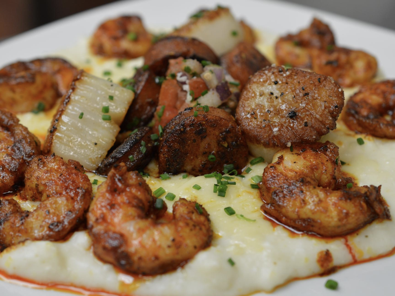 Shrimp and scallops over grits at Acme Lowcountry Kitchen