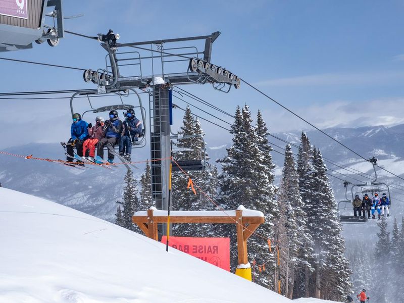 Skiers in Breckenridge, Colorado gondola