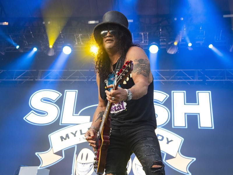 Slash performs at Lollapalooza