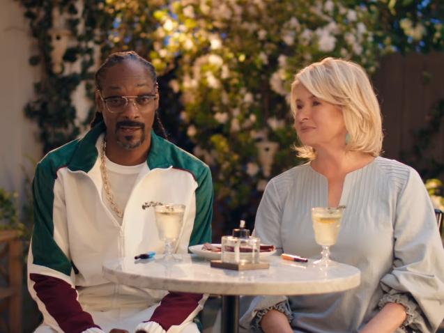 Snoop and Martha at a table