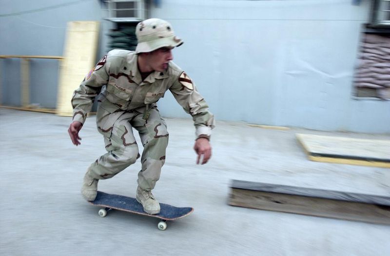 Soldier skateboarding