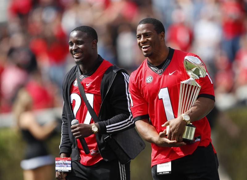 Sony Michel and Nick Chubb laugh