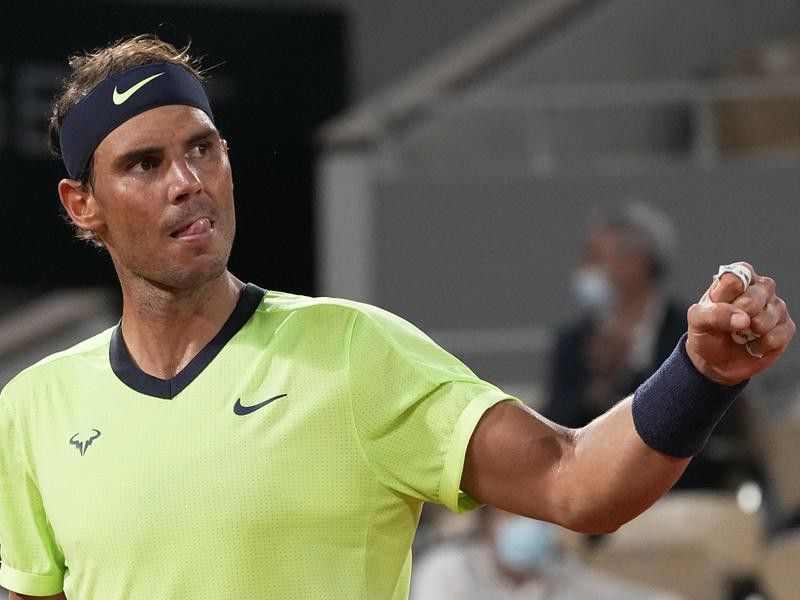 Spain's Rafael Nadal clenches fist as he plays Serbia's Novak Djokovic