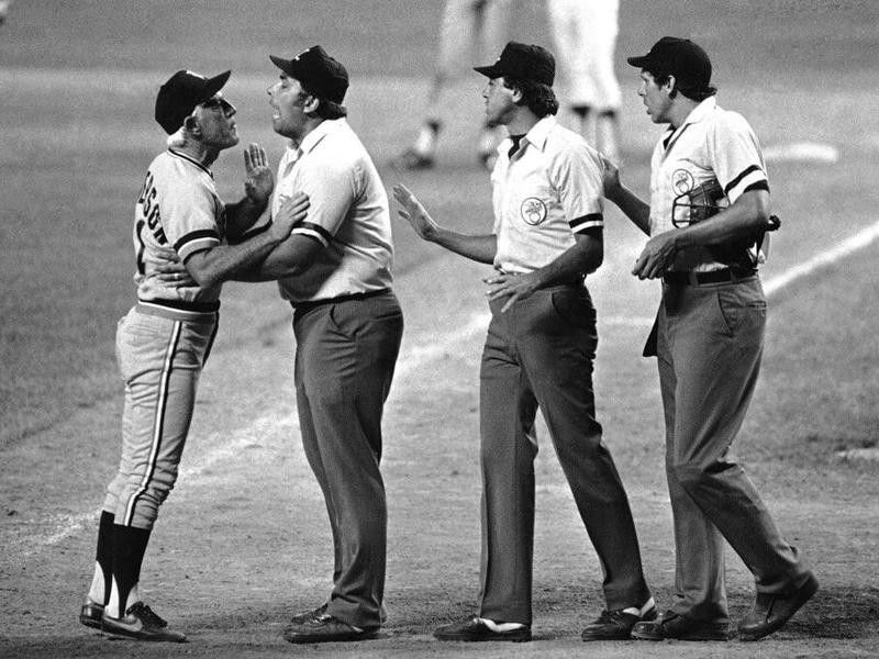 Sparky Anderson held by umpire Greg Kosc