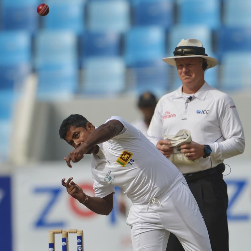 Sri Lanka bowler Rangana Herath bowls a ball