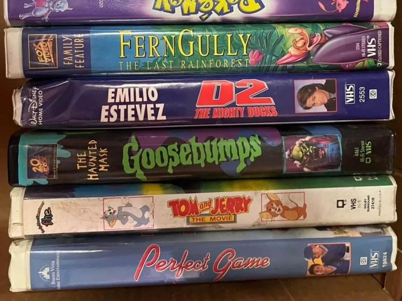 Stack of vhs tapes for sale
