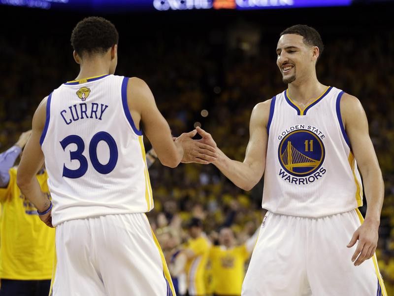 Stephen Curry and Klay Thompson celebrate