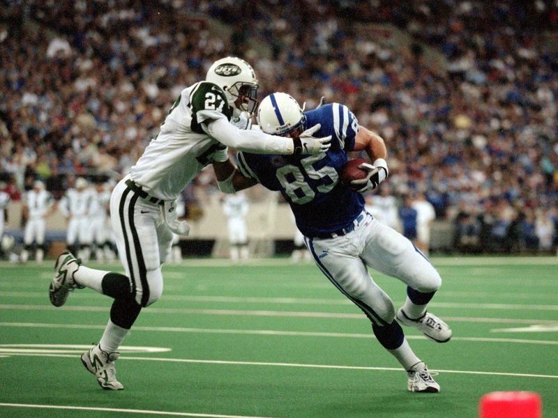 Steve Atwater makes a tackle for the New York Jets