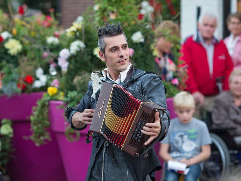 Street musician playing accordion in the Netherlands