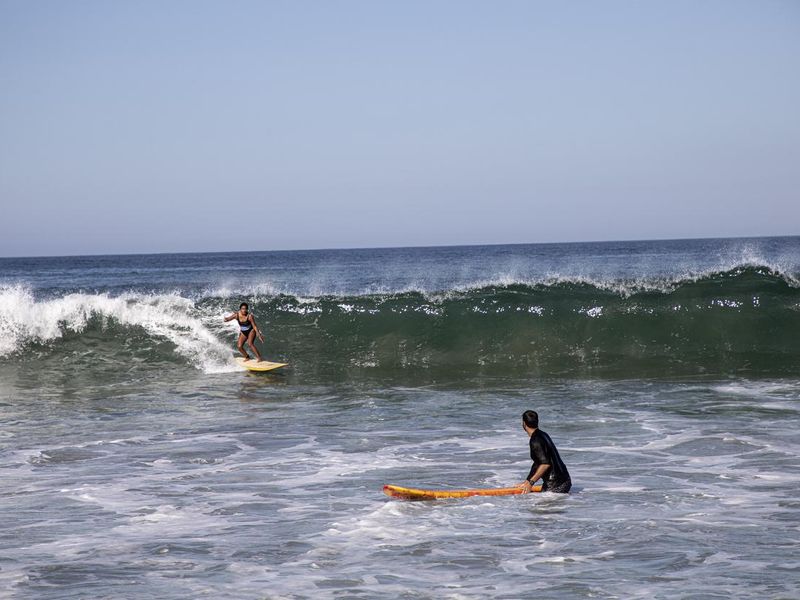 Surfers in Puerto Escondido, Mexico
