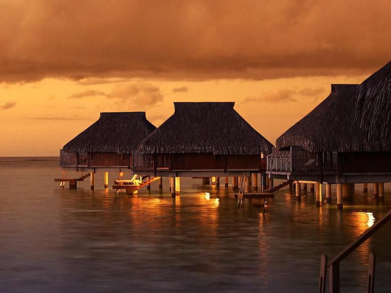 Tahiti bungalows during sunset