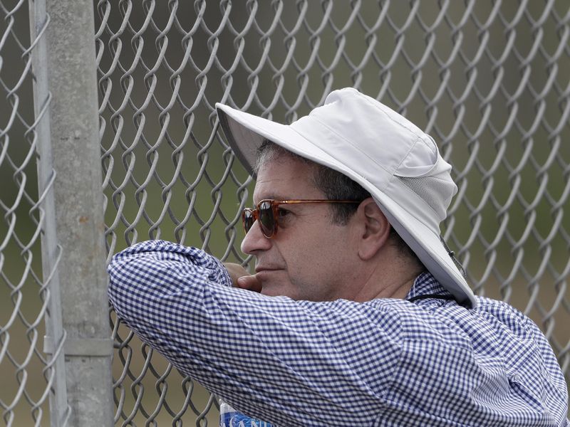 Tampa Bay Rays principle owner Stuart Sternberg watches pitching staff throw