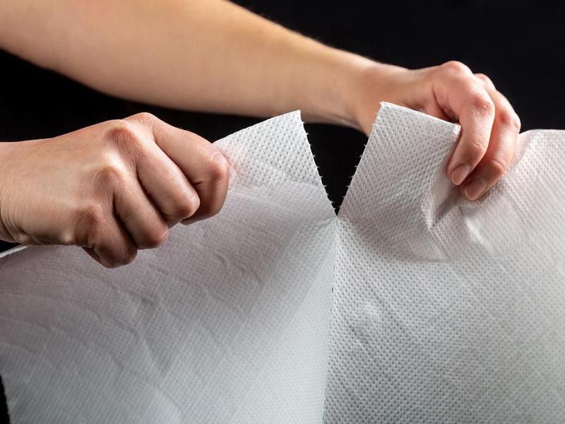 Tearing off a paper towel