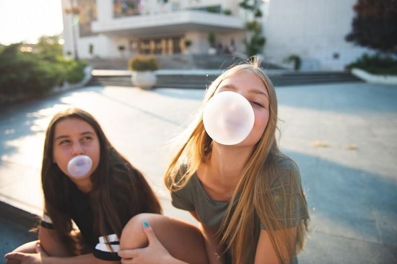 teens chewing gum