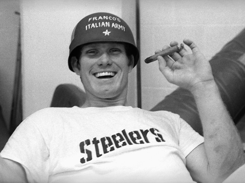 Terry Bradshaw smiling with cigar