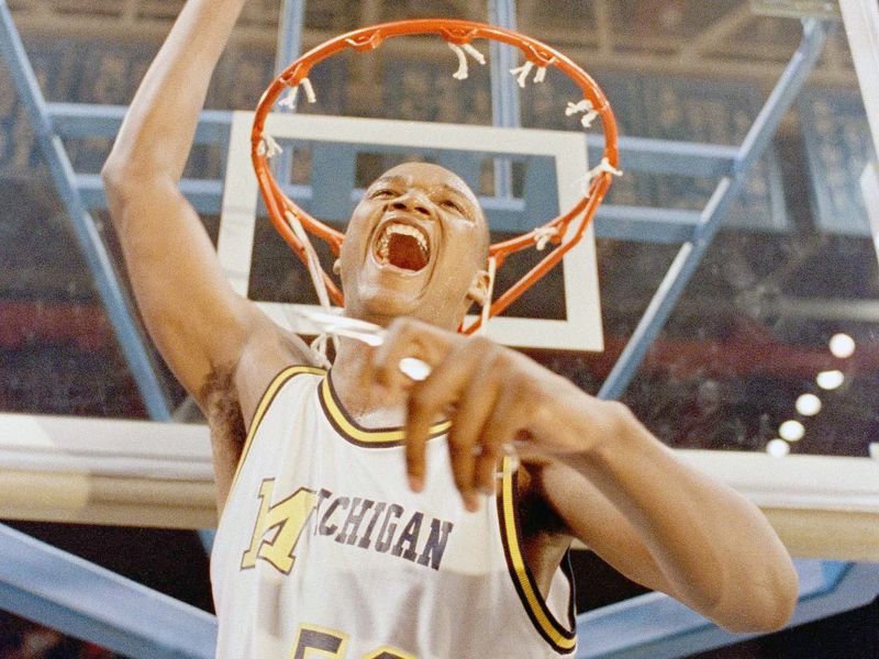 Terry Mills cuts down the net