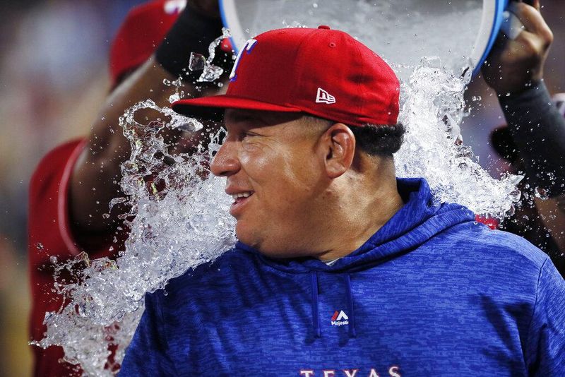 Texas Rangers pitcher Bartolo Colon gets an ice bath