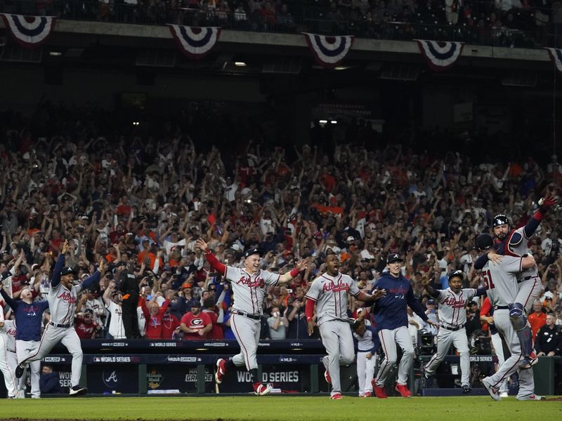 The Atlanta Braves celebrate after winning baseball's World Series in Game 6