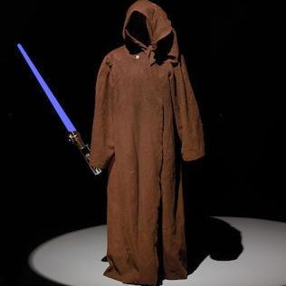 The cloak with lightsaber