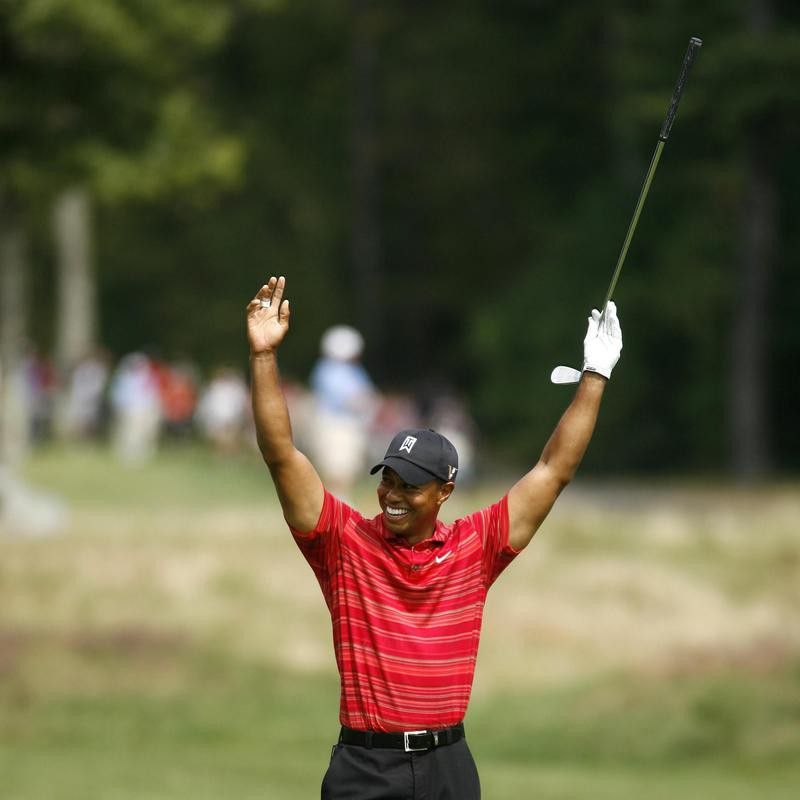 Tiger Woods reacts to his eagle