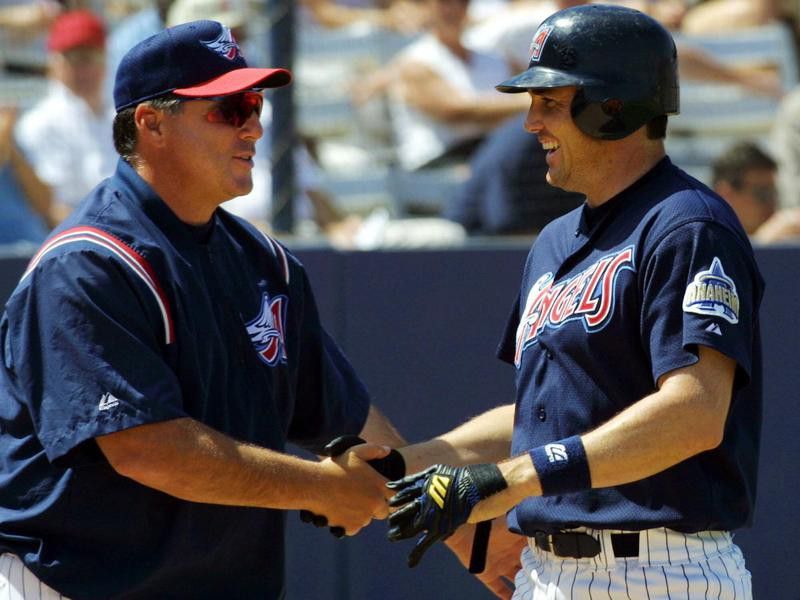 Tim Salmon congratulated by manager Mike Scioscia