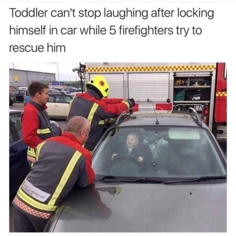 Toddler laughing locked in a car
