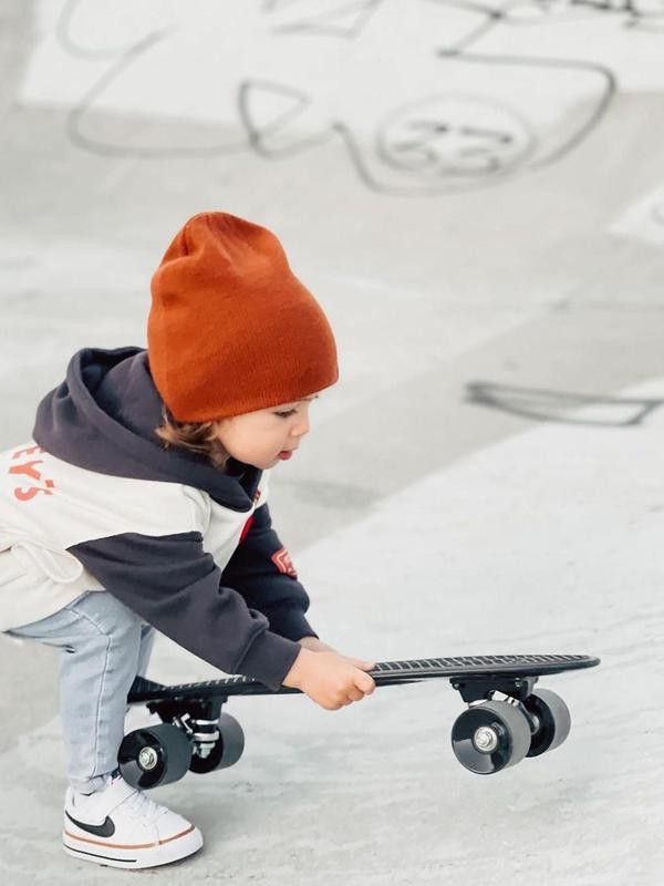 Toddler with a skateboard