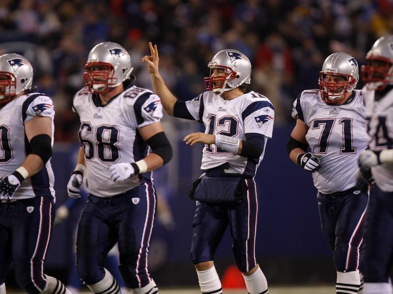 Tom Brady and New England Patriots offensive linemen