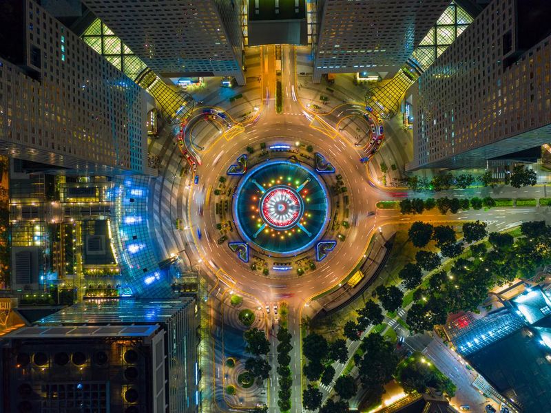 Top view of the Singapore landmark financial business district with skyscraper. Fountain of Wealth at Suntec city in Singapore at night
