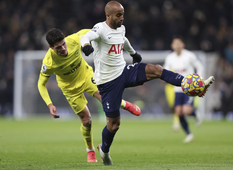 Tottenham's Lucas Moura controls ball ahead of Brentford's Christian Norgaard