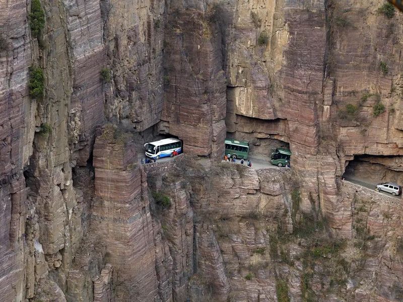 Tourists on Guoliang Tunnel road in China