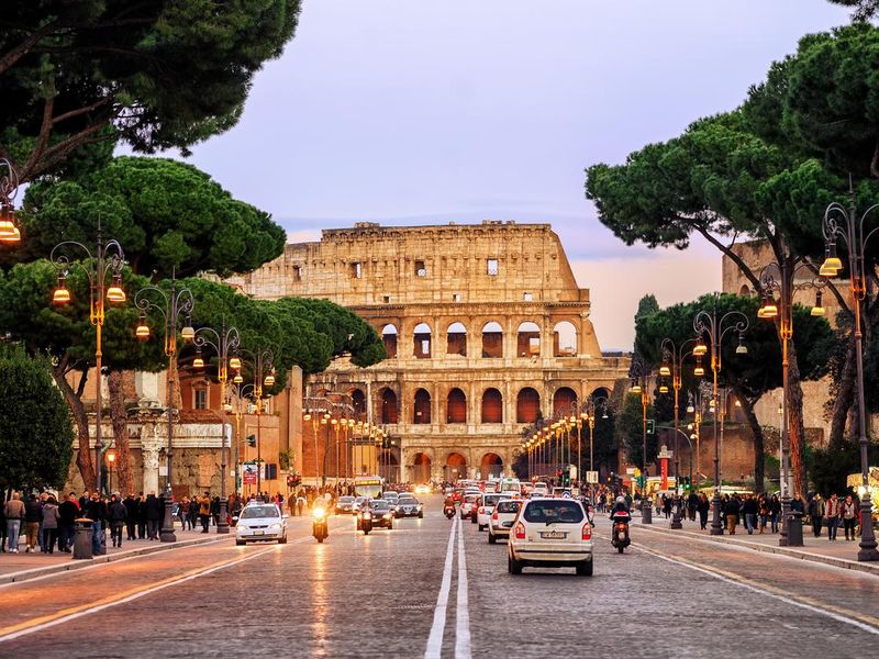 Traffic street in front of Colosseum, Rome, Italy