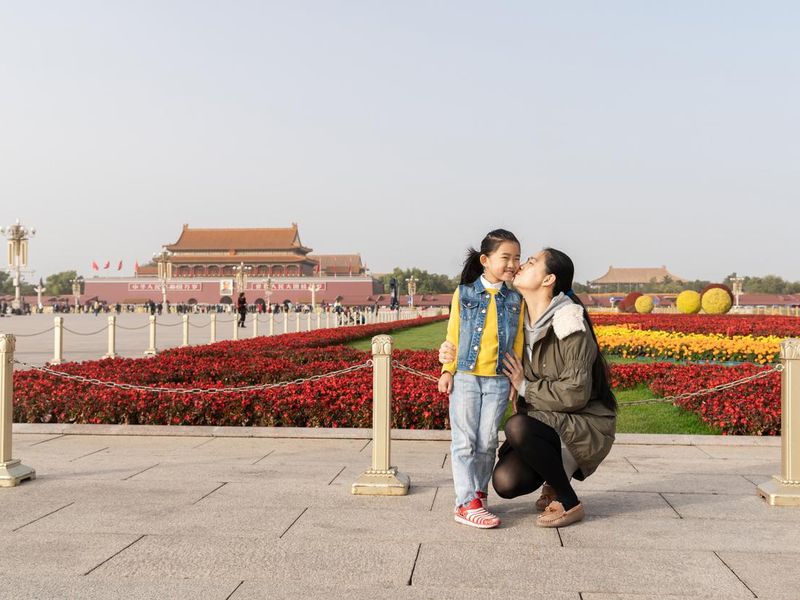 Traveling family in Tiananmen Square
