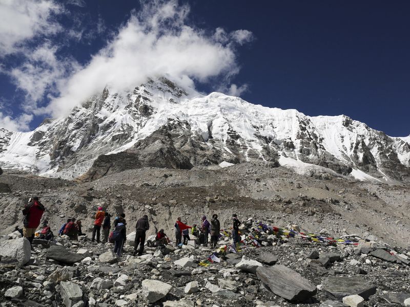 Trekkers rest at Everest Base Camp, Nepa