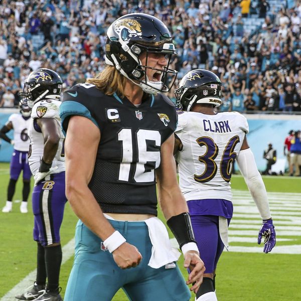 Jacksonville Jaguars quarterback Trevor Lawrence (16) yells in celebration of a touchdown with 14 seconds left in an NFL football game against the Baltimore Ravens, Sunday, Nov. 27, 2022, in Jacksonville, Fla. The Jacksonville Jaguars defeated the Baltimore Ravens 28-27. (AP Photo/Gary McCullough)