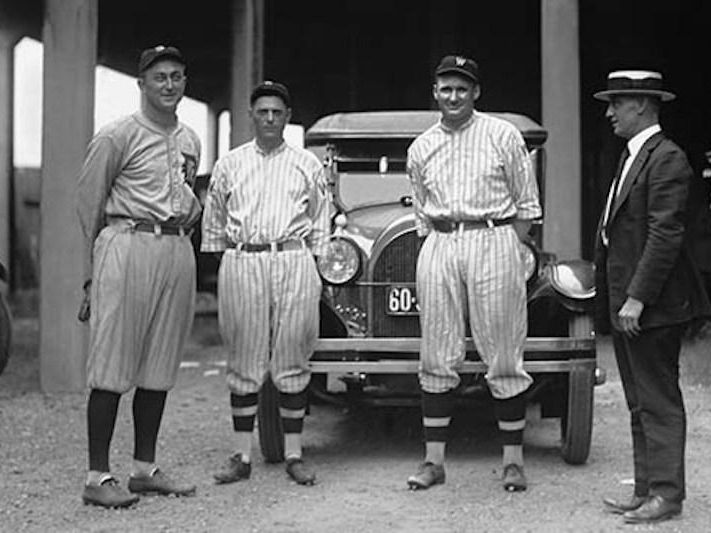 Ty Cobb in front of car