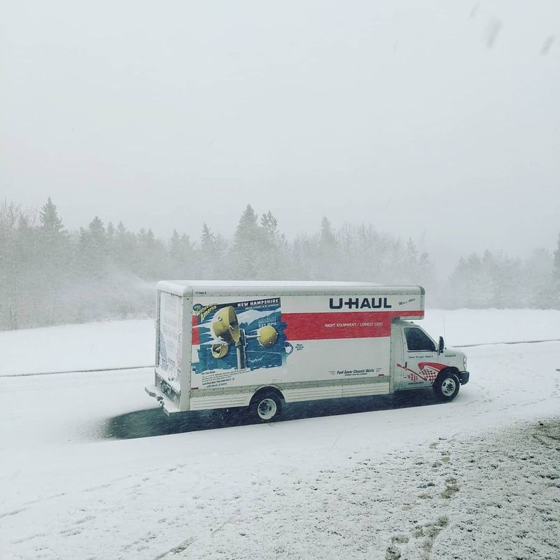 U-Haul driving in the snow