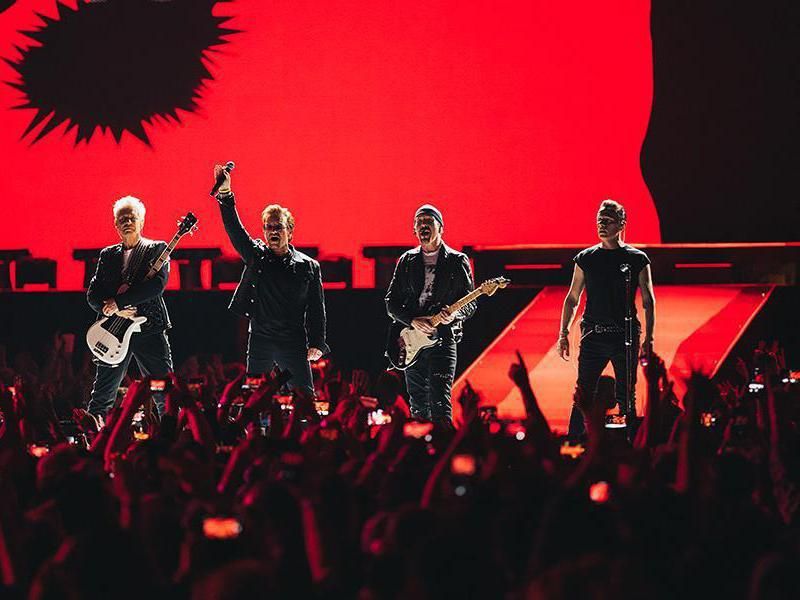 U2 performs onstage