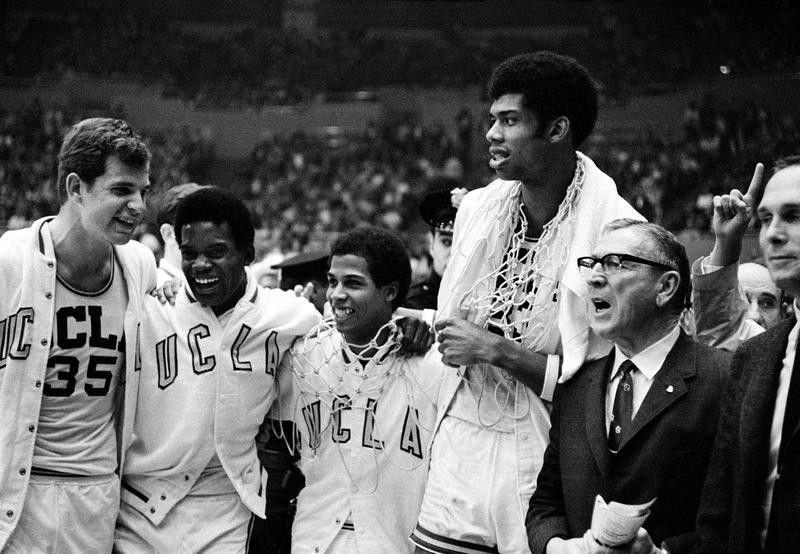 UCLA coach John Wooden celebrates with Mike Lynn, Lucius Allen, Mike Warren and Lew Alcindor after beating North Carolina