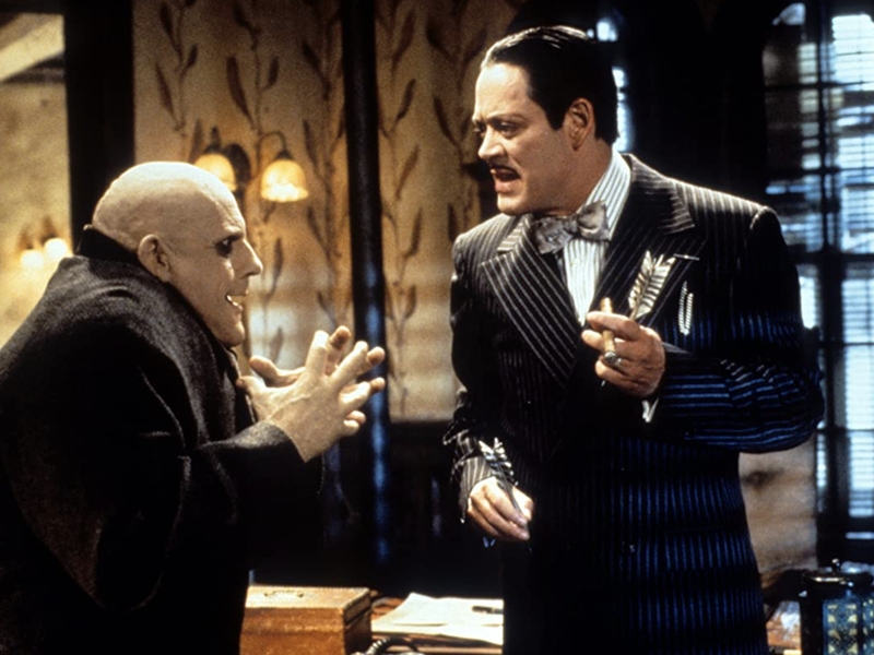 Uncle Fester talking with Gomez