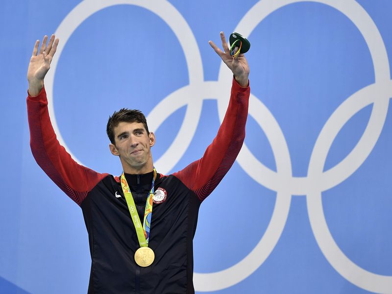 United States' Michael Phelps celebrates after he was awarded the gold medal