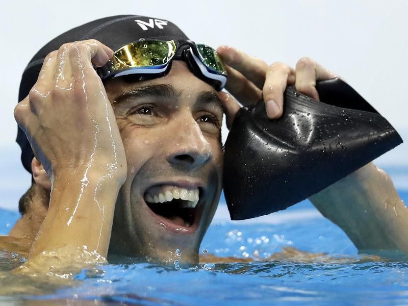 United States' Michael Phelps reacts after men's 100-meter butterfly final