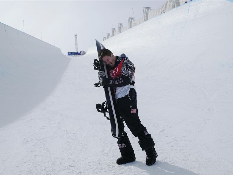 United States' Shaun White gets emotional after 2022 men's halfpipe finals