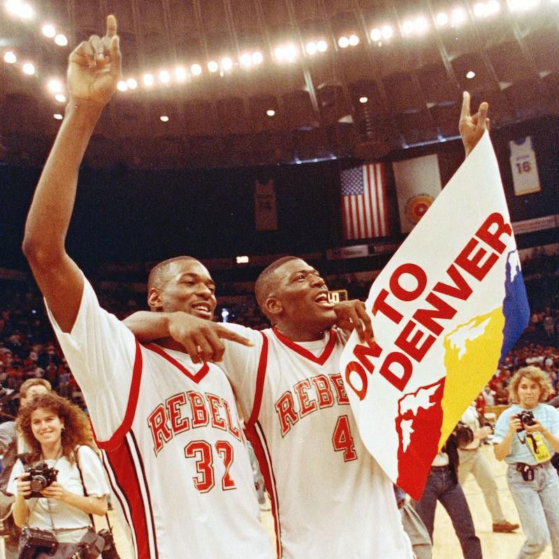 UNLV forwards Stacey Augmon and Larry Johnson celebrate their win over Loyola Marymount